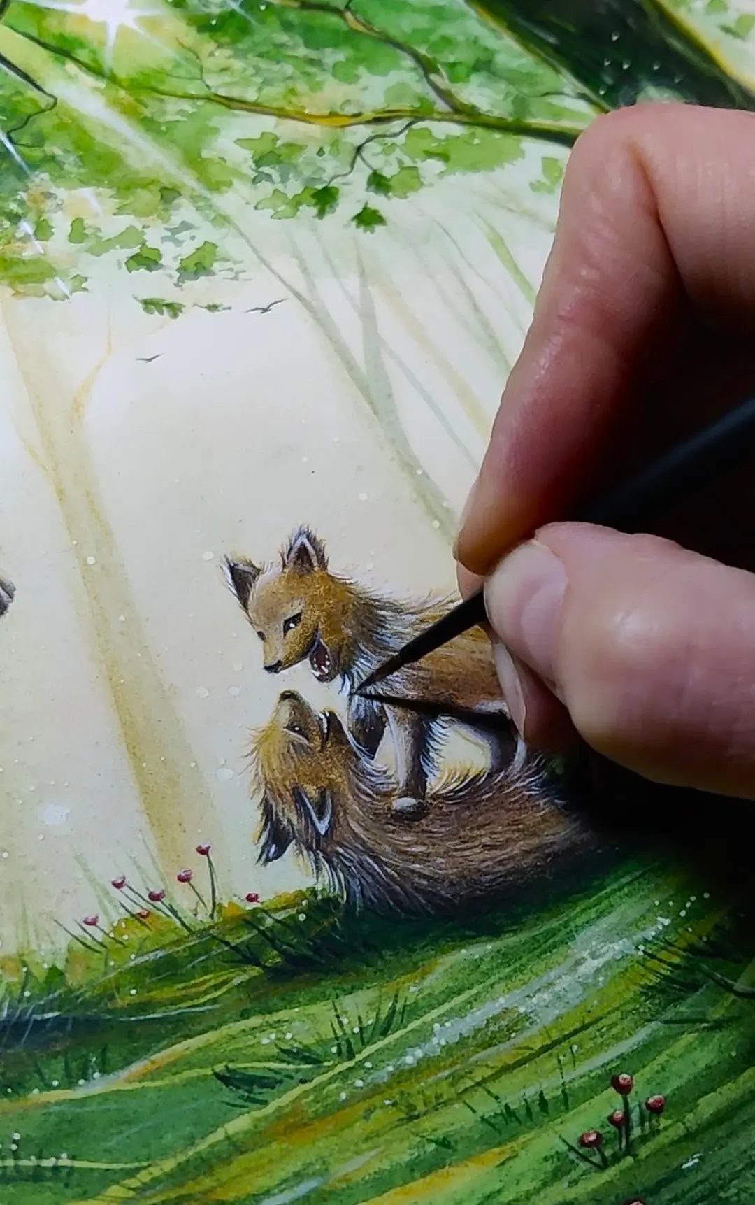 Dana schildert de vossenillustratie met de hand